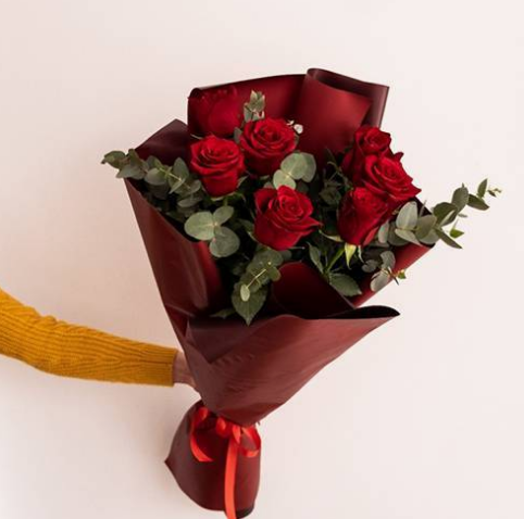 8 Red Roses with greenery