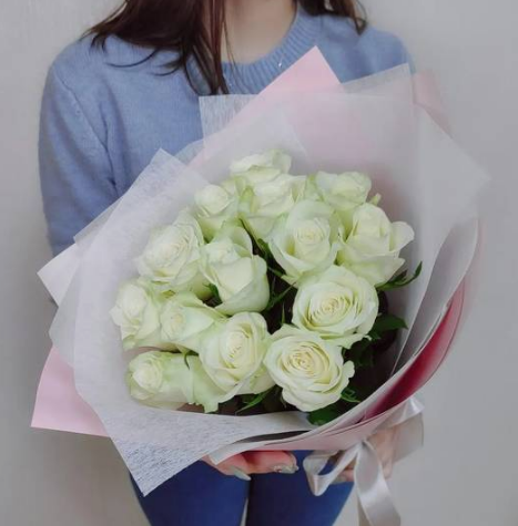 16 White Roses in a white paper