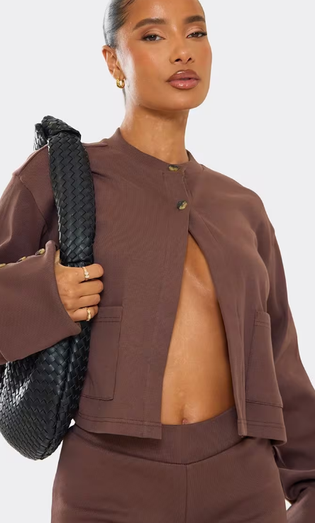 Chocolate-colored ribbed long-sleeved button-up front-pocket detail knitted cardigan, shorts, shoes