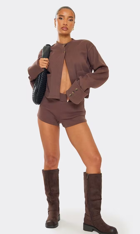 Chocolate-colored ribbed long-sleeved button-up front-pocket detail knitted cardigan, shorts, shoes